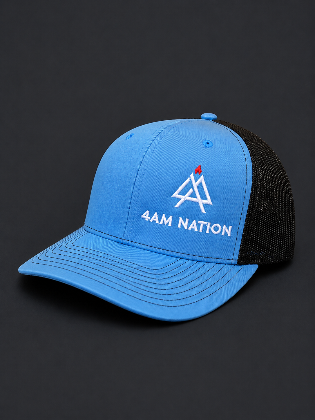 Columbia blue and black hat with '4AM Nation' logo on a dark background