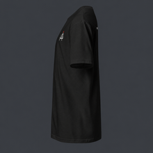 Load image into Gallery viewer, Black t-shirt left side view with '4 AM NATION' logo on the left chest against a dark background