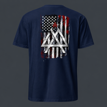 Load image into Gallery viewer, Navy blue t-shirt with "4 AM NATION" American flag and abstract design on the back against a dark gray background